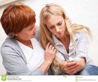 mature and young mother soothes crying daughter mature women calm young sad woman royalty free stock photography