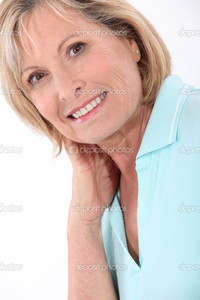 mature blonde depositphotos mature blonde woman wearing turquoise polo shirt having large smile stock photo