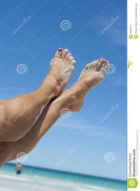 mature legs female legs tropical beach stock photos