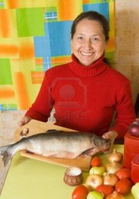 mature red jackf mature woman red fish kitchen photo