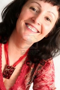 mature red hallgerd portrait beautiful brunette mature woman wearing red blouse photo