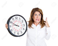 mom mature atic closeup portrait mature woman worker holding clock looking anxiously pressured lack running out stock photo overwhelmed mom