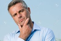 outdoor mature rido perplexed mature man looking camera outdoor confused photo