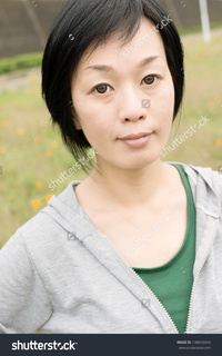 outdoor mature stock photo portrait sport mature asian woman outdoor daytime