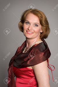 red mature libertos smiling middle aged woman red dress stock photo mature beautiful