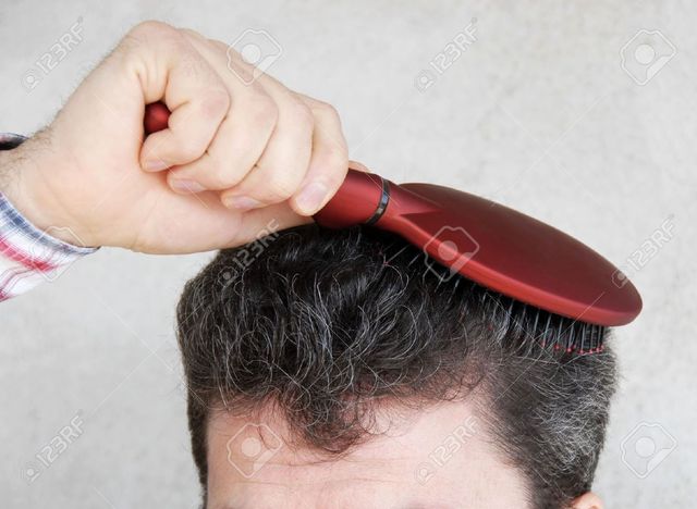 red mature hair mature black photo man red hairbrush simply brushing greyish