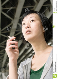 mature close up woman smoking closeup portrait mature asian under bridge city daytime royalty free stock photography