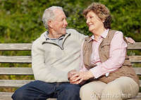 outdoor mature romantic mature couple sitting bench outdoor stock