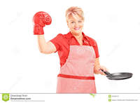red mature smiling female apron red boxing glove holding frying mature pan isolated white background stock photos