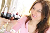 red mature elenathewise mature woman toasting glass red wine stock photo attractive